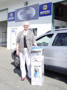 Irene and her new pressure washer | Mid Island Automotive